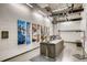 Ski storage and repair room with work bench and equipment for maintaining skis at 4200 W 17Th Ave # 508, Denver, CO 80204