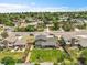 Aerial view showcasing the house with a manicured lawn, fenced backyard, and established landscaping within a residential area at 9225 Lowell Blvd, Westminster, CO 80031