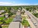 Aerial view of the property and neighborhood, with mature trees and convenient access to the main thoroughfare at 9225 Lowell Blvd, Westminster, CO 80031