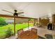 Inviting covered patio perfect for dining al fresco, with views of the backyard at 9225 Lowell Blvd, Westminster, CO 80031