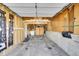 Functional garage with concrete floor for parking and storage at 9225 Lowell Blvd, Westminster, CO 80031