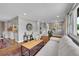 Spacious living room featuring hardwood floors and an open layout perfect for entertaining guests at 9225 Lowell Blvd, Westminster, CO 80031