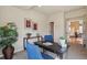 Bright office space with natural light, complemented by comfortable blue chairs at 6584 S Sedalia St, Aurora, CO 80016