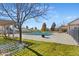 Attractive community pool with well kept grounds in early winter at 6584 S Sedalia St, Aurora, CO 80016