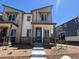 Charming two-story home featuring a stylish modern design and a welcoming front porch at 6658 N Nepal Ct, Aurora, CO 80019