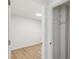 Bright bedroom with new vinyl floors, large closet with lighting, and new paint at 1023 S Alcott St, Denver, CO 80219