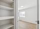 View of bedroom showcasing new vinyl floors, large closet, and new paint at 1023 S Alcott St, Denver, CO 80219