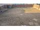 Spacious backyard with a wooden fence, perfect for outdoor activities and gardening at 47375 Lilac Ave, Bennett, CO 80102