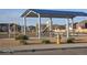 Playground with picnic tables, covered area and a nearby fire hydrant at 47375 Lilac Ave, Bennett, CO 80102