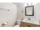 Renovated bathroom featuring a modern vanity with white countertops and updated fixtures at 1620 S Ivory Cir # C, Aurora, CO 80017