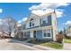 Attractive exterior view of townhome with pleasant architectural details and tidy landscaping at 1620 S Ivory Cir # C, Aurora, CO 80017