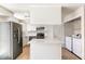 Updated kitchen with stainless appliances and quartz island, plus convenient laundry area at 1620 S Ivory Cir # C, Aurora, CO 80017