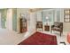 Inviting bedroom showcasing ample natural light with dual chairs and a beautiful rug at 2552 E Alameda Ave # 74, Denver, CO 80209