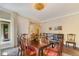 Elegant dining room featuring a hardwood floors, classic furniture, and elegant light fixture at 2552 E Alameda Ave # 74, Denver, CO 80209