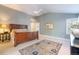 Main bedroom with a large window and door leading into the adjoining bathroom at 2552 E Alameda Ave # 74, Denver, CO 80209