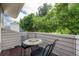 Cozy patio area with mosaic table and chairs, perfect for outdoor relaxation at 2552 E Alameda Ave # 74, Denver, CO 80209