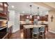 Gourmet kitchen with stainless steel appliances, granite countertops, and a spacious island with bar seating at 2317 Primo Rd # A, Highlands Ranch, CO 80129