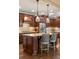 Gourmet kitchen with stainless steel appliances, granite countertops, and a large island with barstool seating at 2317 Primo Rd # A, Highlands Ranch, CO 80129