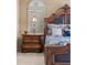 Close up on the main bedroom's nightstand and decorative bedding at 2317 Primo Rd # A, Highlands Ranch, CO 80129