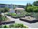 The community garden provides a space for residents to grow plants and connect with nature at 9180 E Center Ave # 9D, Denver, CO 80247