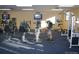 Community fitness center featuring cardio equipment and weight machines for residents' health and wellness at 9180 E Center Ave # 9D, Denver, CO 80247