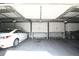 Spacious garage interior with ample storage space for vehicles and other belongings at 9180 E Center Ave # 9D, Denver, CO 80247