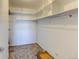 Spacious walk-in closet with ample shelving offers plenty of room for storage and organization at 9180 E Center Ave # 9D, Denver, CO 80247