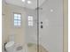 Contemporary bathroom with glass-enclosed shower and built-in bench at 7162 S Fillmore Cir, Centennial, CO 80122