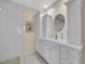 Well-lit bathroom boasts a large vanity with ample storage and walk-in shower at 7162 S Fillmore Cir, Centennial, CO 80122