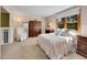 Bright bedroom features a large window and traditional furnishings at 7162 S Fillmore Cir, Centennial, CO 80122