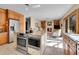 Spacious kitchen boasts a large island, modern appliances, and seamless flow into the cozy living area at 7162 S Fillmore Cir, Centennial, CO 80122