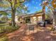 Charming brick patio with outdoor dining set and lush landscaping at 7162 S Fillmore Cir, Centennial, CO 80122
