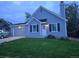 Charming two-story home featuring a well-maintained lawn and a classic architectural style at 17605 E Temple Dr, Aurora, CO 80015