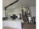 Modern kitchen featuring white cabinets, stainless steel appliances, and a breakfast bar with seating at 17605 E Temple Dr, Aurora, CO 80015