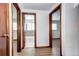 Hallway view of bathroom with tiled shower and modern fixtures at 6340 Quay St, Arvada, CO 80003