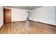 Inviting living room with gleaming hardwood floors, neutral walls, and ample space at 6340 Quay St, Arvada, CO 80003