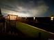 Backyard featuring a hot tub, pergola, and artificial grass at 14419 Dahlia St, Thornton, CO 80602