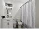 Updated bathroom with decorative mirror and modern vanity at 14419 Dahlia St, Thornton, CO 80602