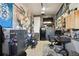 Garage decorated as a Personal cave with workspace and custom decor at 14419 Dahlia St, Thornton, CO 80602