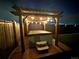 Hot tub covered with pergola and string lights at 14419 Dahlia St, Thornton, CO 80602