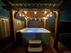 Hot tub with pergola and string lights at 14419 Dahlia St, Thornton, CO 80602