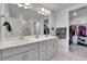 Bathroom features double sinks, shower, and a walk-in closet at 6350 N Lisbon St, Aurora, CO 80019
