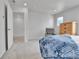 Bedroom boasting carpet, a dresser, windows with views, and an accent chair at 6350 N Lisbon St, Aurora, CO 80019