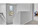 Bright staircase with a window and white trim at 6350 N Lisbon St, Aurora, CO 80019