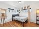 Guest bedroom with decor art and hardwood floors at 1325 S Clermont St, Denver, CO 80222