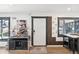 Warm entryway featuring hardwood floors, art, and a console table at 1325 S Clermont St, Denver, CO 80222