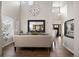 Dining room featuring an oversized mirror, high ceilings, and access to the home's entryway at 1102 Buffalo Ridge Rd, Castle Pines, CO 80108