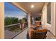 Inviting outdoor porch featuring comfortable seating and attractive railings at 1102 Buffalo Ridge Rd, Castle Pines, CO 80108