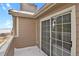 Balcony features paneled siding and views of a lake at 4760 S Wadsworth Blvd # G304, Littleton, CO 80123