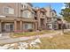 View of exterior elevation showing entrance and stairs to upper levels at 4760 S Wadsworth Blvd # G304, Littleton, CO 80123